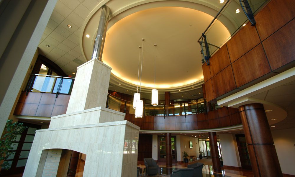 Chesterbrook Corporate Center view looking up at the two-story lobby and fireplace
