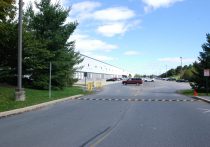 Roadway Entrance to Amazon Warehouse Exterior within Boulder Business Center