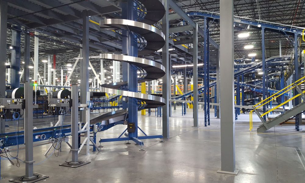 Geodis warehouse interior view with conveyor and automation systems