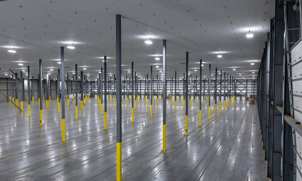 wide view of interior warehouse with drop ceiling