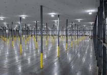 wide view of interior warehouse with drop ceiling