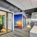 interior office rendering with hallway, conference room and desks