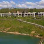 Atwater Corporate Center Exterior View with Pond in Front and Road