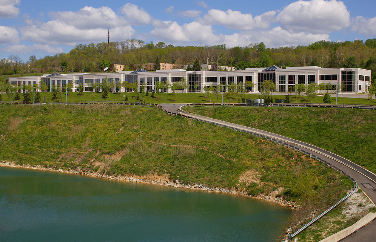 Atwater Corporate Center Exterior View with Pond in Front and Road