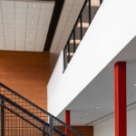 view of upper level in building and stairs