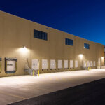 night view of warehouse side view with dock doors