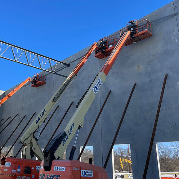 Penntex field employees on cranes of jobsite