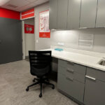 Medical office interior with sink, countertop and chair