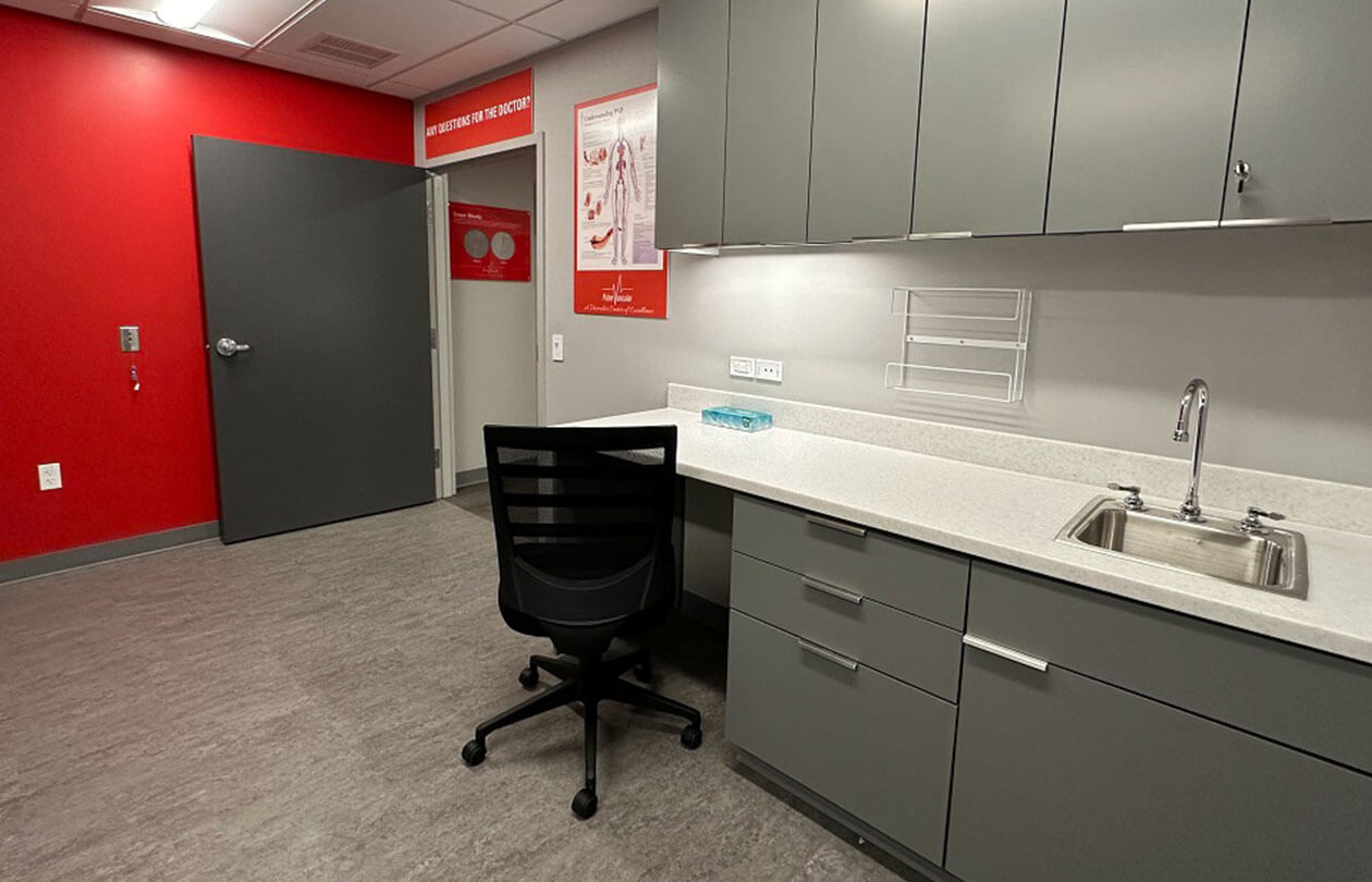 Medical office interior with sink, countertop and chair