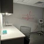 Interior doctor's office with Pulse Vascular on the wall