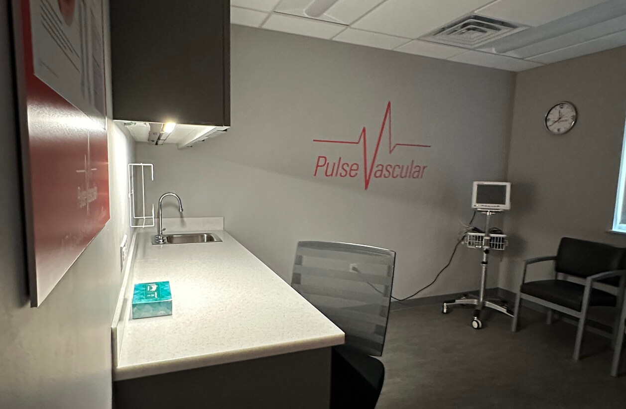 Interior doctor's office with Pulse Vascular on the wall