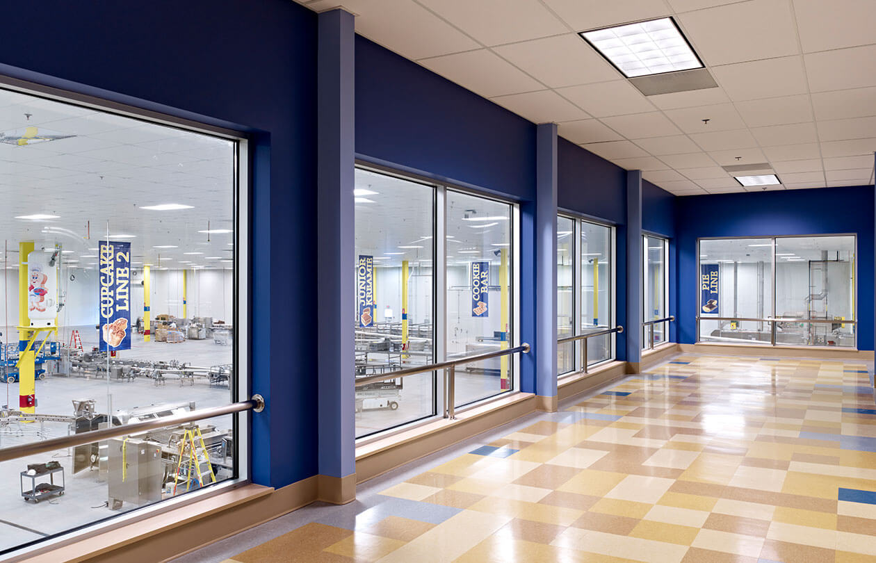 tastykake view of production line through catwalk windows