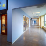 long hallway with blue walls