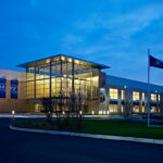 exterior of tastykake facility at night lit up