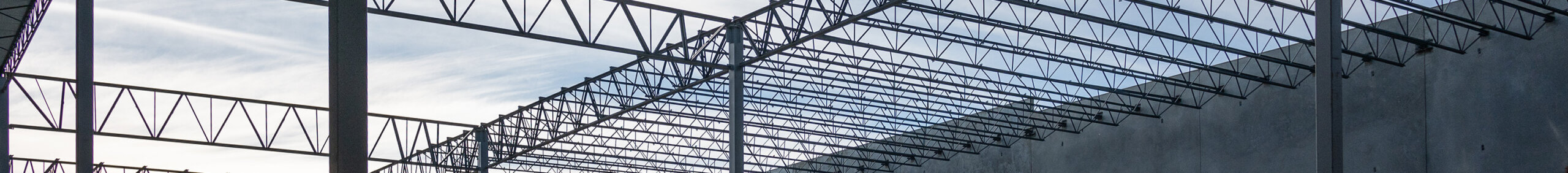 ariel view of steel beams in active construction site scaled