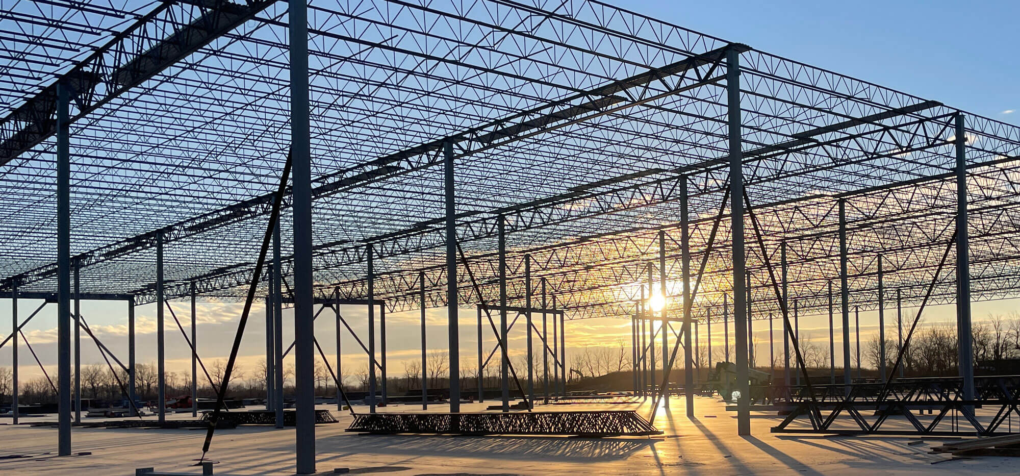 image of building structure with sun shining through