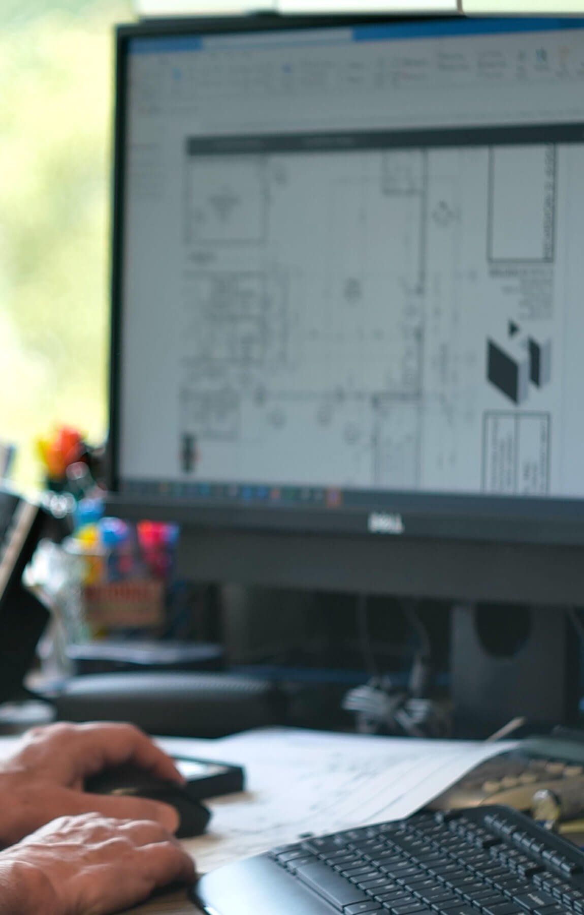 design build person on computer flex image left