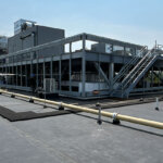 view of equipment on the roof of a manufacturing facility