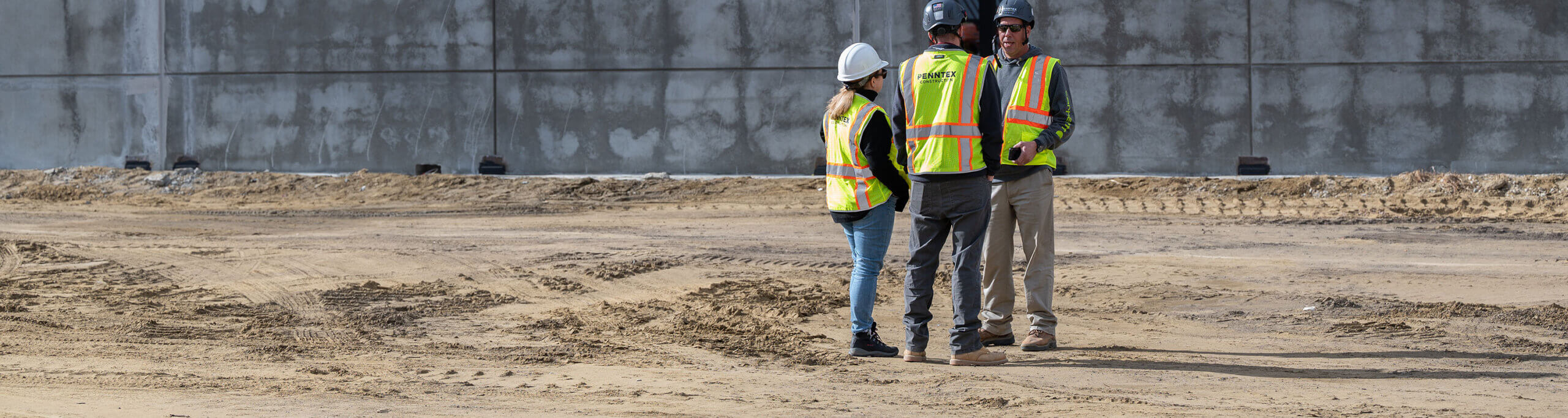 penntex team talking about project onsite scaled