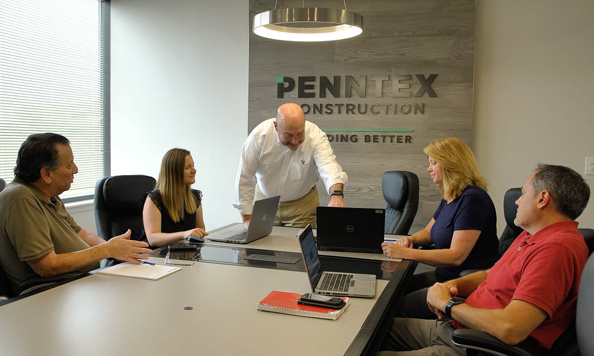 preconstruction penntex team meeting in office