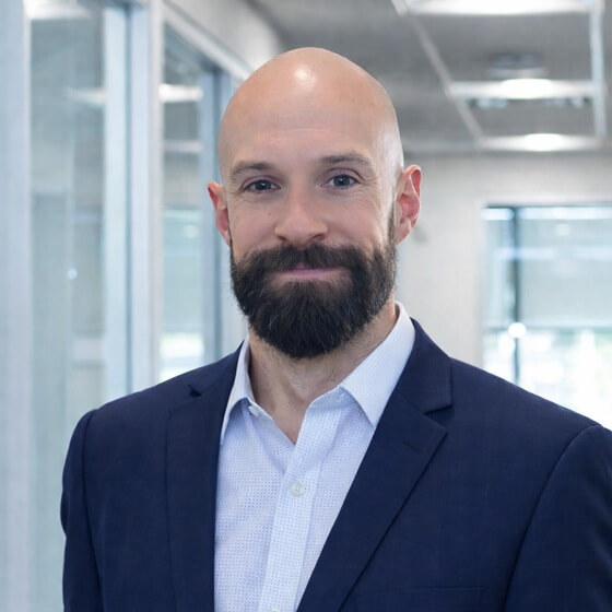 Chris Hoolehan headshot in office setting