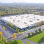 aerial view of large warehouse and surroundings grounds