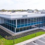 front entrance of office building with windows angled view