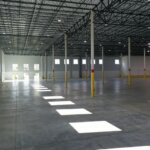 Interior warehouse with pillars and windows