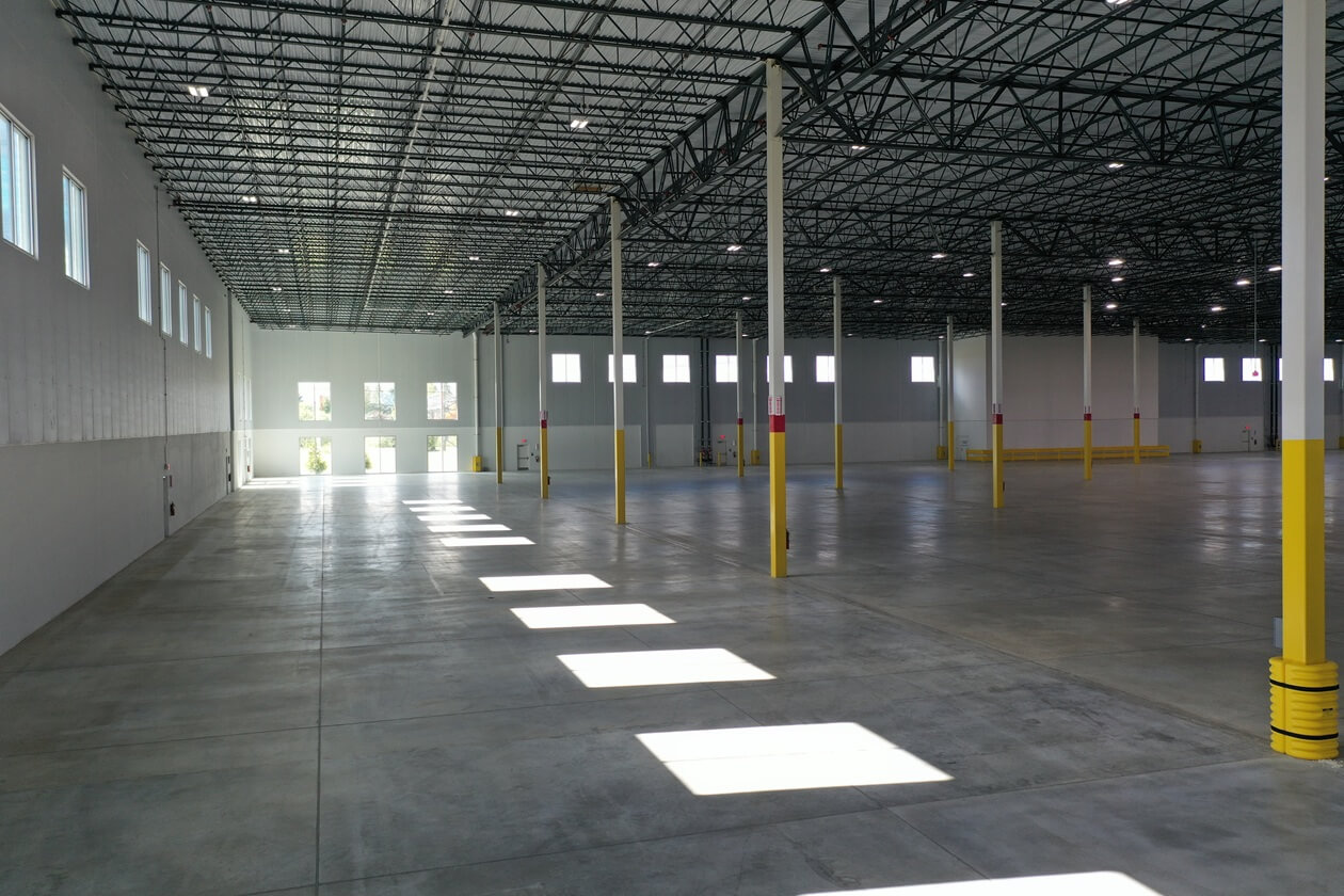 Interior warehouse with pillars and windows