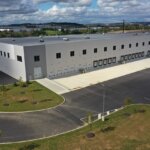 aerial shot of back of warehouse with loading docks