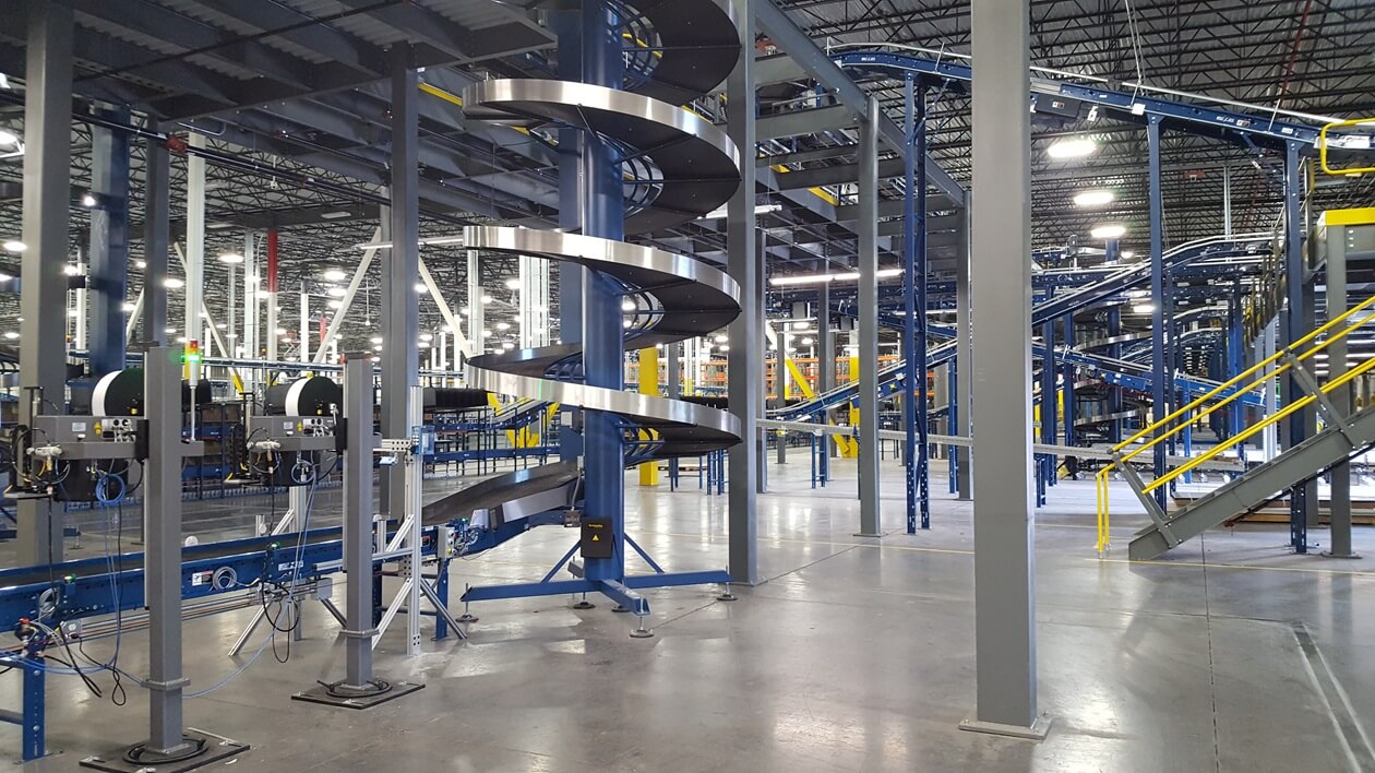 Interior production facility with conveyors and racking