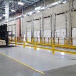 Interior production facility including dock doors