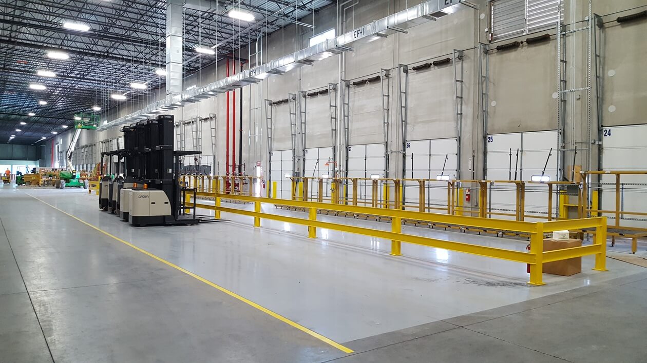 Interior production facility including dock doors