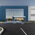 Front of warehouse with blue wall