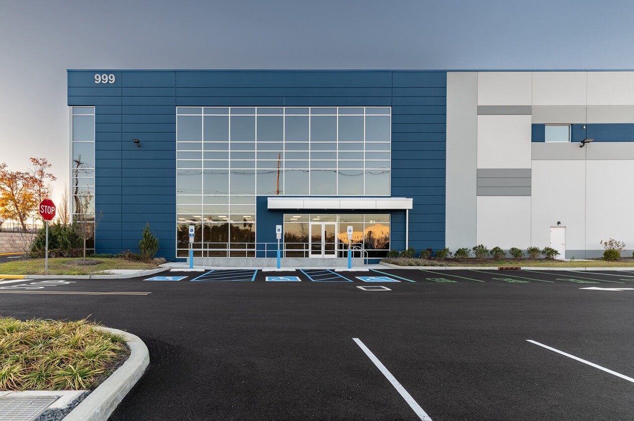 Front of warehouse with blue wall