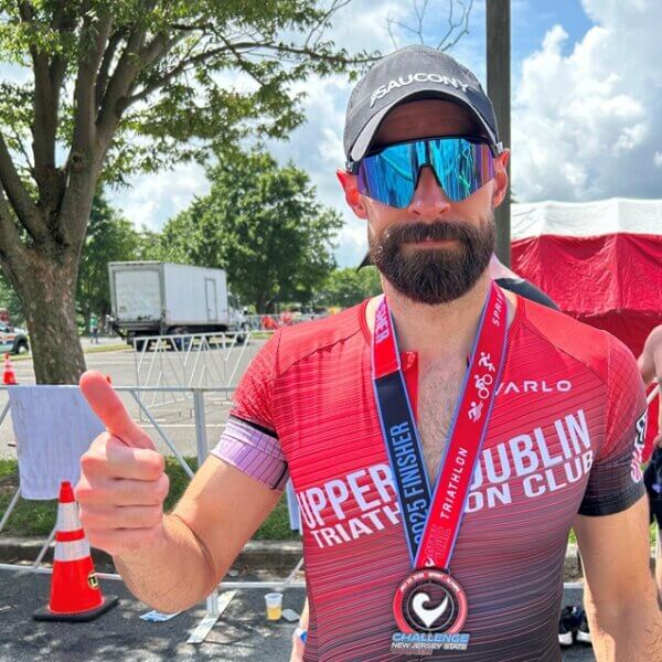 Triathalon participant giving a thumbs up