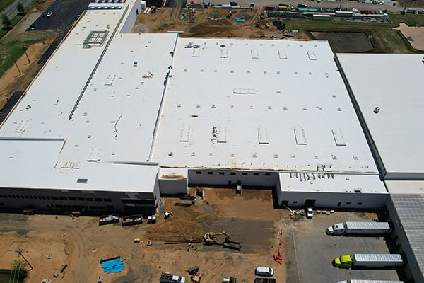 Lassonde manufacturing facility under construction aerial view